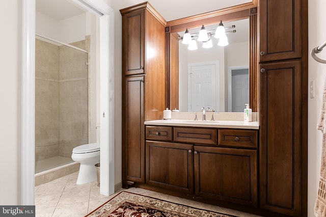 bathroom featuring an enclosed shower, vanity, tile patterned flooring, and toilet