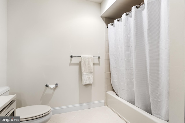 full bathroom with shower / bath combination with curtain, toilet, tile patterned flooring, and vanity