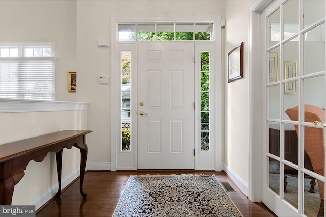 foyer featuring dark hardwood / wood-style flooring