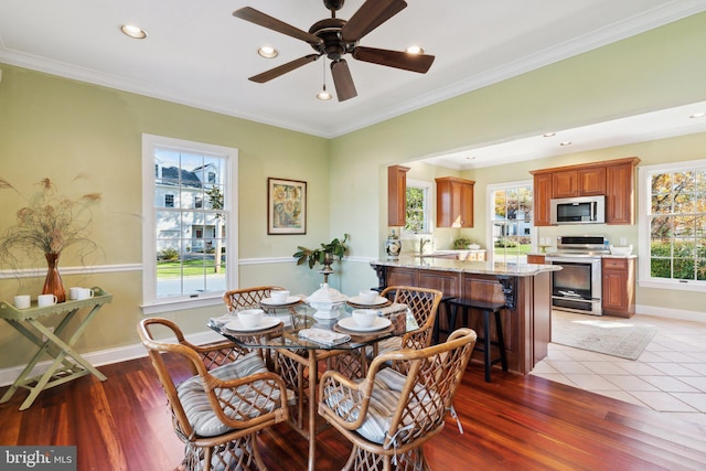 216 Chew E, Saint Michaels, MD 21663 - dining area featuring crown molding, recessed lighting, baseboards, light wood finished floors, and ceiling fan
