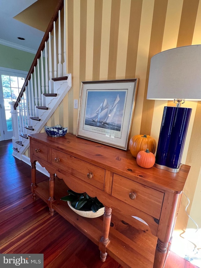 room details featuring hardwood / wood-style flooring and crown molding