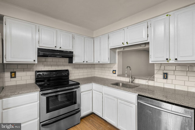 kitchen with white cabinets, black electric range oven, sink, and dishwasher