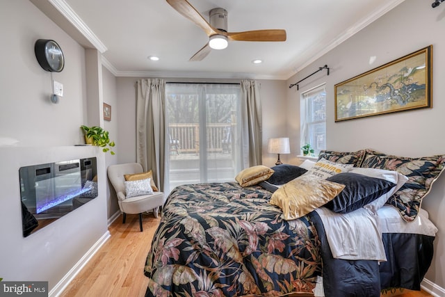 bedroom featuring access to outside, light hardwood / wood-style flooring, crown molding, and ceiling fan