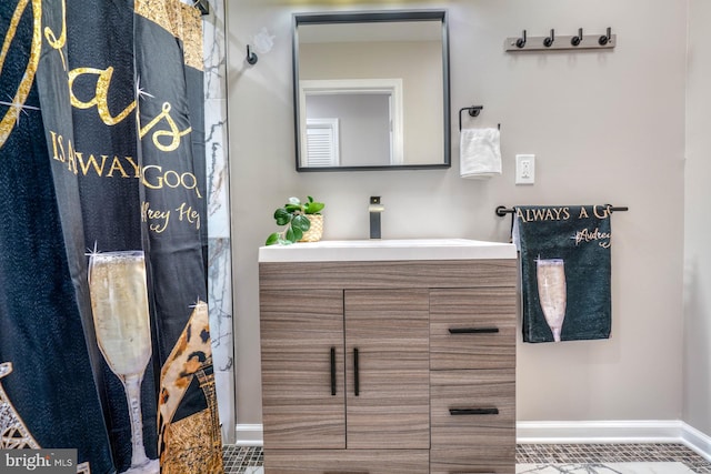 bathroom with vanity and tile patterned flooring