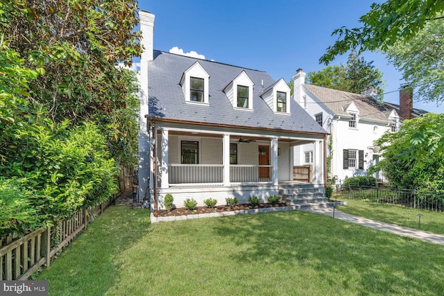 6019 Utah Ave NW, Washington, DC 20015 - cape cod house with covered porch, a chimney, and ceiling fan