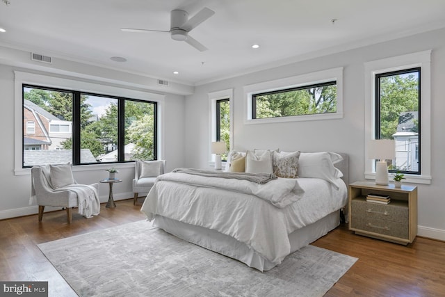 6019 Utah Ave NW, Washington, DC 20015 - bedroom with baseboards, crown molding, wood finished floors, recessed lighting, and ceiling fan