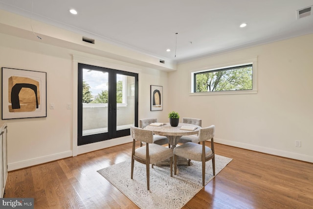6019 Utah Ave NW, Washington, DC 20015 - dining space featuring french doors, crown molding, baseboards, recessed lighting, and light wood-type flooring