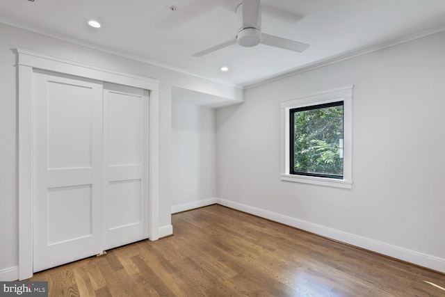 6019 Utah Ave NW, Washington, DC 20015 - unfurnished bedroom with ornamental molding, baseboards, wood finished floors, recessed lighting, and a closet