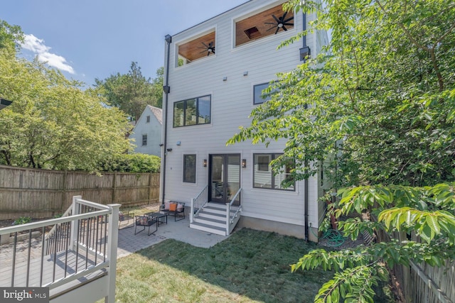 6019 Utah Ave NW, Washington, DC 20015 - rear view of house with a patio and a ceiling fan