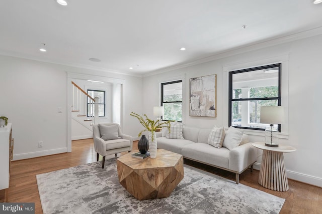 6019 Utah Ave NW, Washington, DC 20015 - living area with stairway, plenty of natural light, ornamental molding, baseboards, and recessed lighting