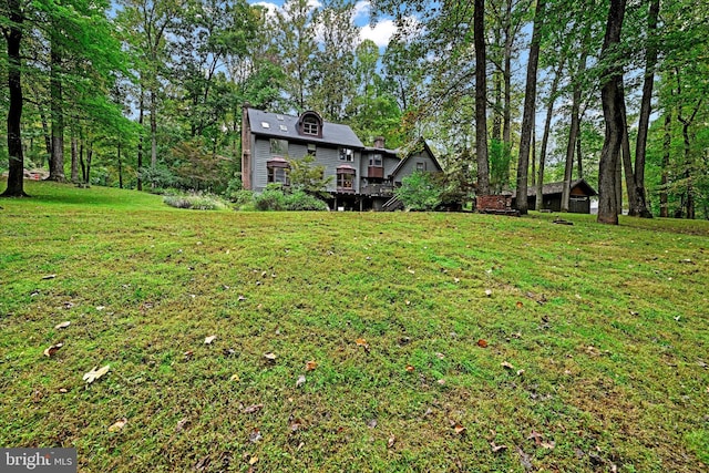 view of yard featuring a deck