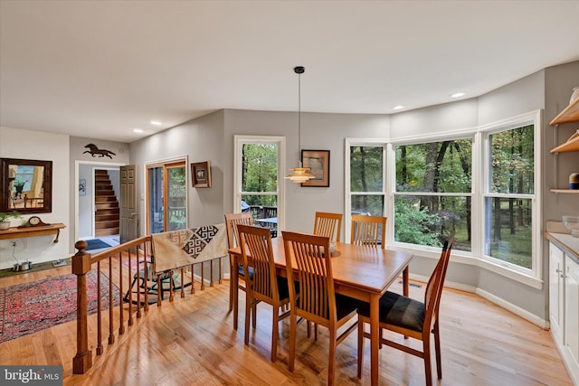 dining room with light wood-type flooring