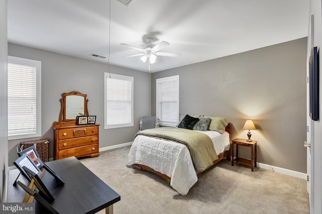 carpeted bedroom featuring ceiling fan