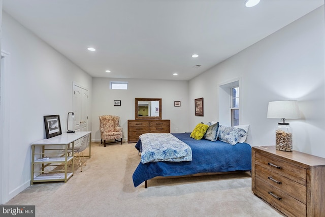 bedroom with light carpet