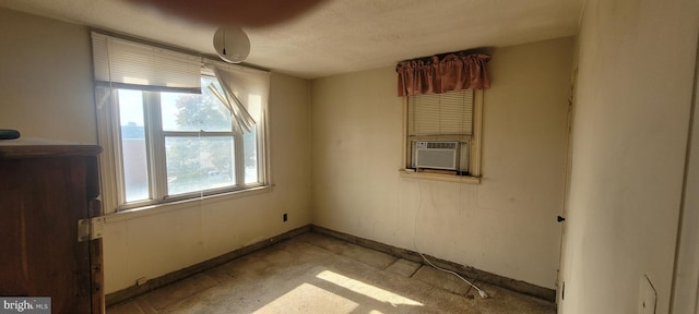 empty room featuring a textured ceiling