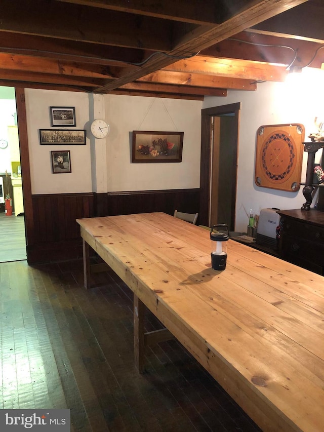 174 Jamison City Rd, Benton, PA 17814 - dining room with dark hardwood / wood-style flooring and wooden walls