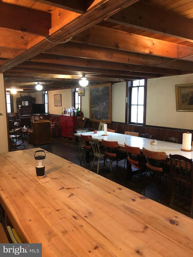 174 Jamison City Rd, Benton, PA 17814 - dining area with wood walls and beam ceiling