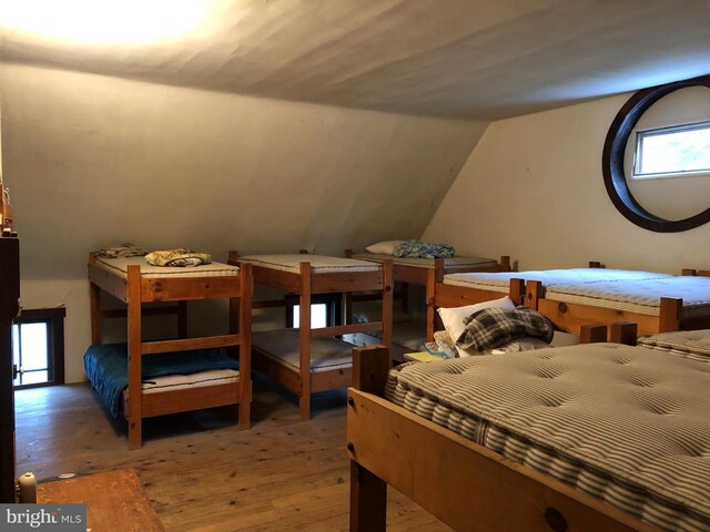174 Jamison City Rd, Benton, PA 17814 - bedroom featuring wood-type flooring and lofted ceiling
