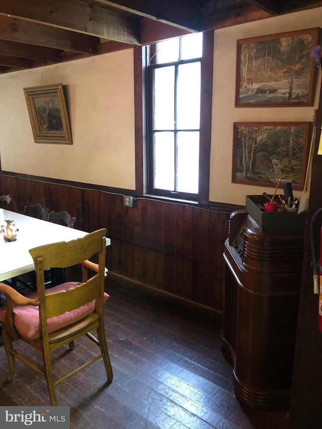 174 Jamison City Rd, Benton, PA 17814 - dining area featuring wooden walls and dark wood-type flooring