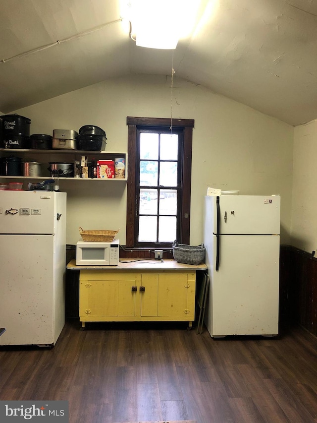 174 Jamison City Rd, Benton, PA 17814 - kitchen featuring dark hardwood / wood-style floors, white appliances, and vaulted ceiling