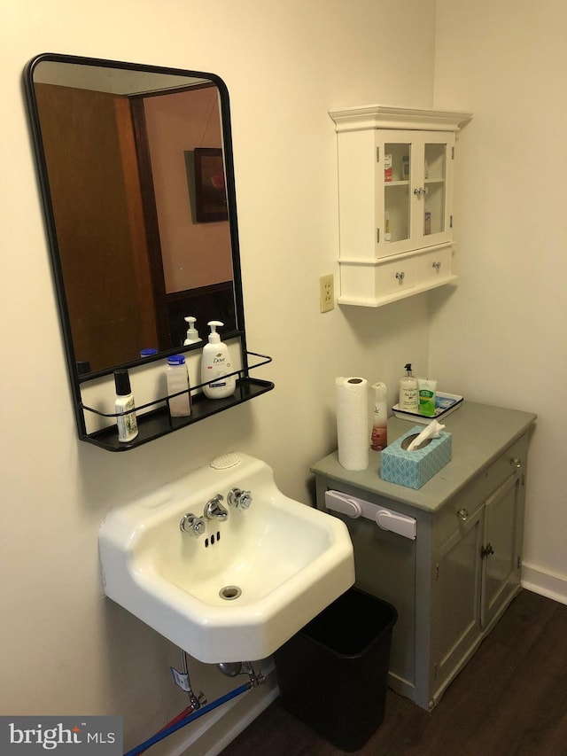 174 Jamison City Rd, Benton, PA 17814 - bathroom featuring hardwood / wood-style floors and sink
