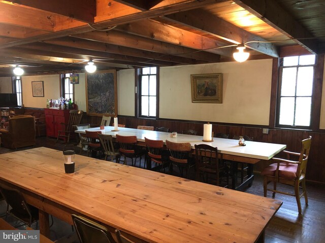 174 Jamison City Rd, Benton, PA 17814 - dining room with wooden walls, hardwood / wood-style flooring, and a healthy amount of sunlight