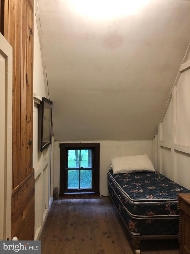 174 Jamison City Rd, Benton, PA 17814 - unfurnished bedroom featuring dark hardwood / wood-style flooring and lofted ceiling
