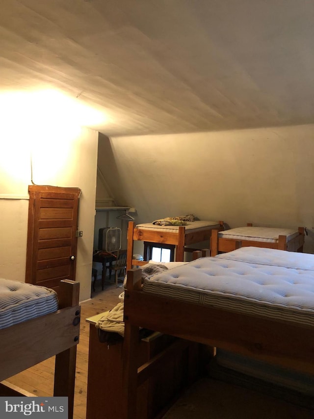 174 Jamison City Rd, Benton, PA 17814 - bedroom featuring light hardwood / wood-style floors and vaulted ceiling