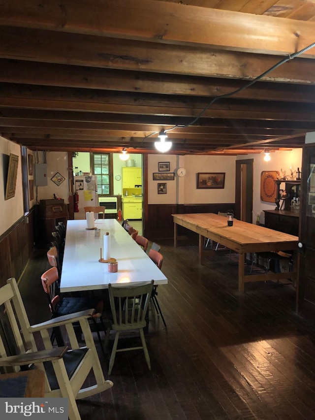 174 Jamison City Rd, Benton, PA 17814 - dining room featuring wooden walls and dark hardwood / wood-style flooring