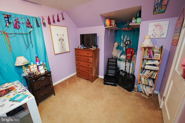 carpeted bedroom featuring vaulted ceiling