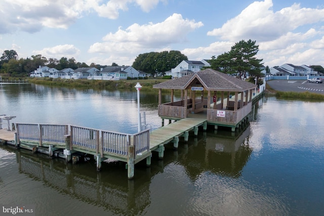 dock area featuring a water view and a gazebo