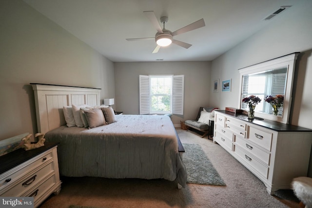 carpeted bedroom featuring ceiling fan