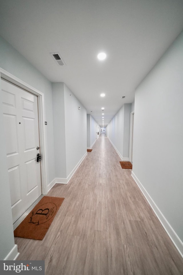 corridor featuring light wood-type flooring