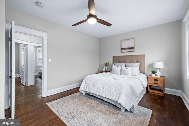 bedroom featuring dark wood-type flooring and ceiling fan