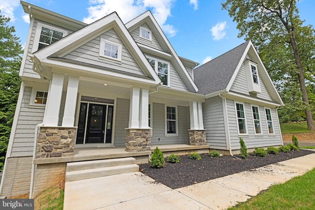 view of front of property featuring covered porch