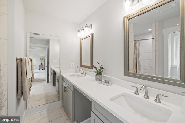 bathroom with vanity and curtained shower