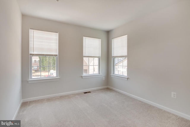 view of carpeted spare room