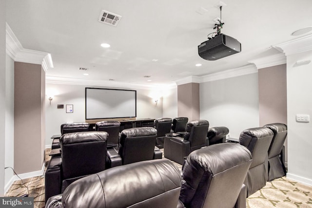 cinema room featuring ornamental molding and light hardwood / wood-style flooring