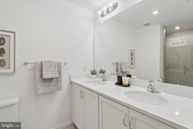 16444 River View Dr, Bristol, PA 19007 - full bath featuring a stall shower, toilet, double vanity, and recessed lighting