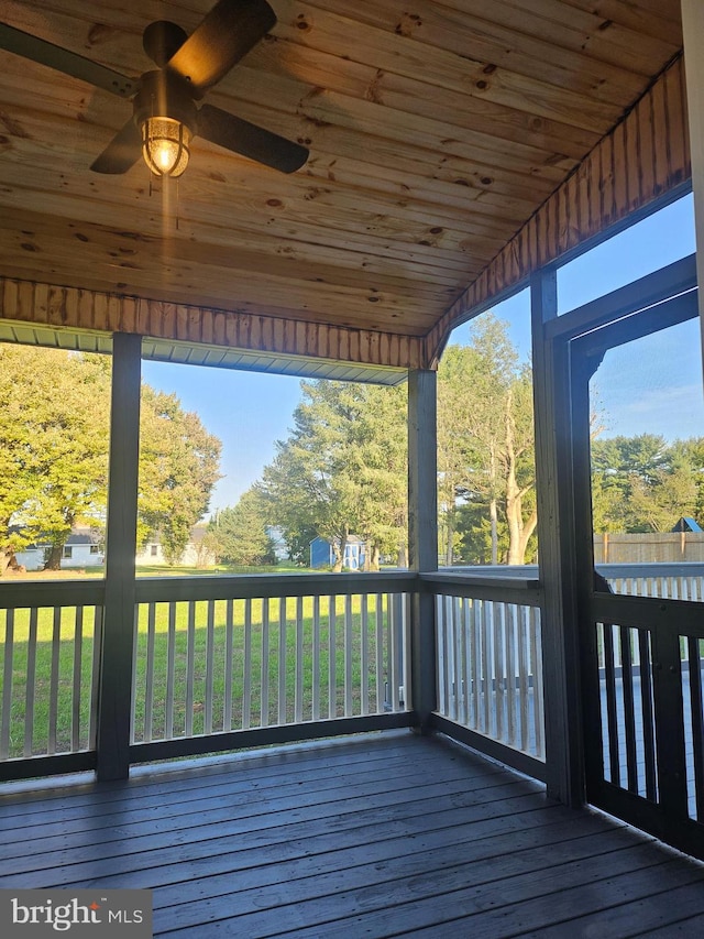 wooden terrace with ceiling fan