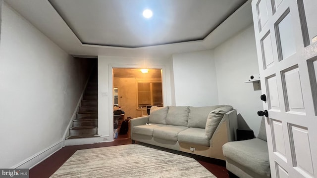 living room featuring dark wood-type flooring