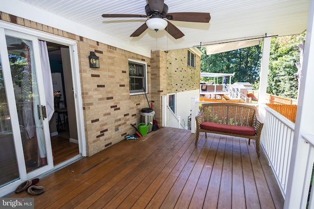 wooden terrace with ceiling fan