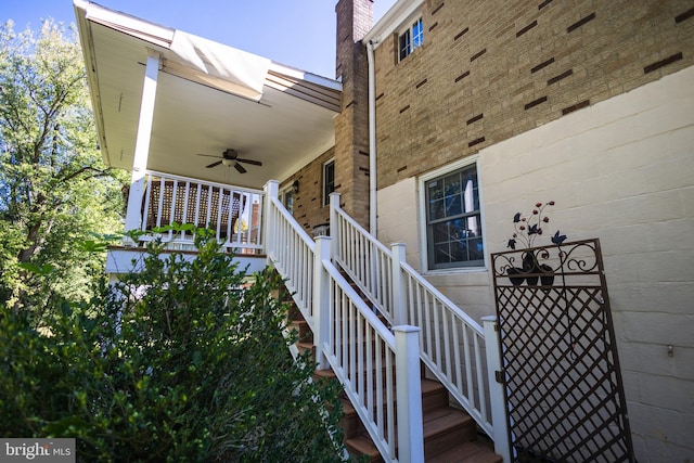 exterior space with ceiling fan