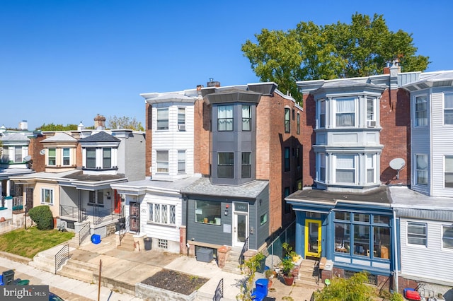 view of front of property with a residential view