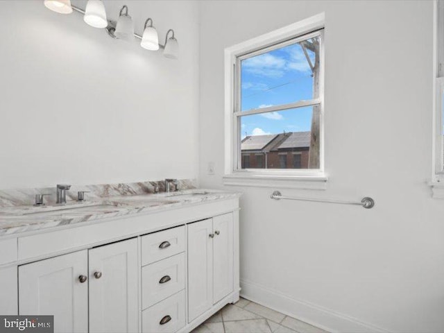 bathroom with vanity and tile patterned flooring