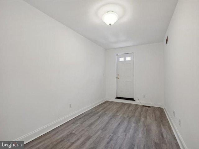 unfurnished room featuring light hardwood / wood-style flooring