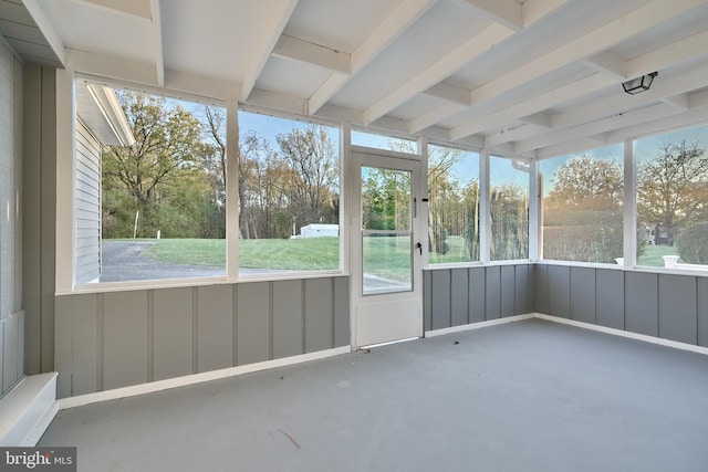 unfurnished sunroom featuring a healthy amount of sunlight