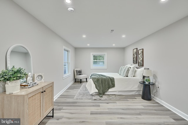 bedroom with light wood-type flooring