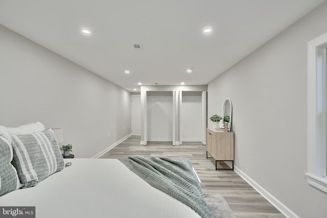 bedroom featuring light wood-type flooring