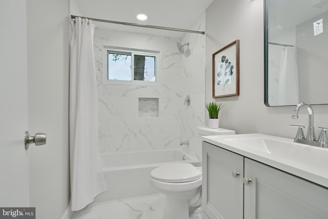 full bathroom featuring toilet, vanity, and shower / tub combo